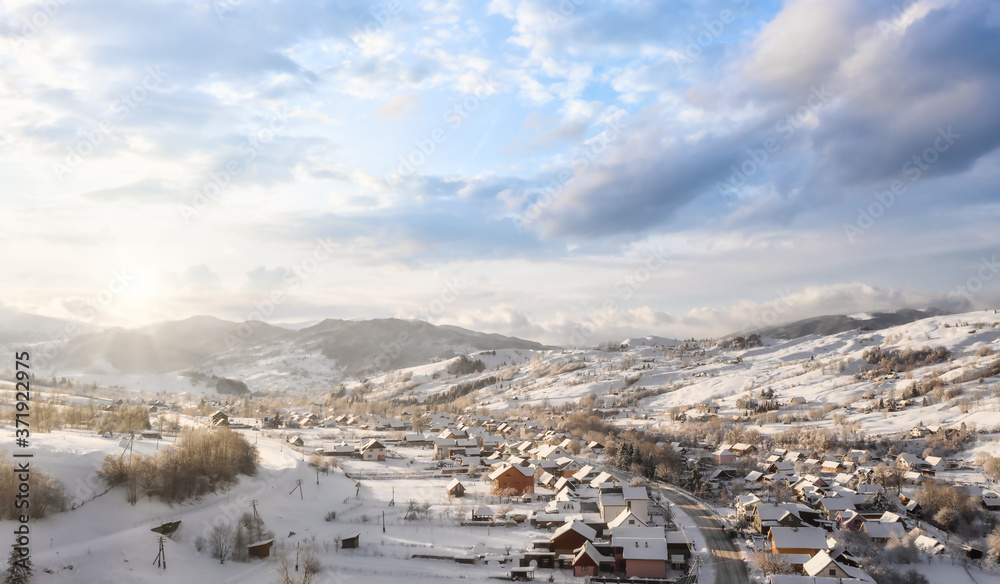 Beautiful village in a mountain winter landscape