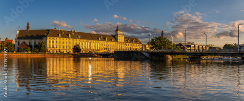 Panorama of the historic district of Wrocław seen from the water in the golden hour