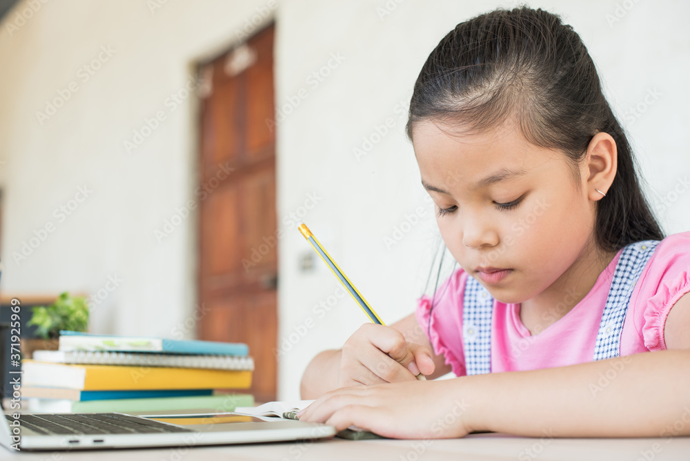 asian girl student online learning study online with video call teacher. social distance during quarantine, self-isolation, online education concept, homeschool, stay at home entertainment. asian girl student online learning study online with video call teacher. social distance during quarantine, self-isolation, online education concept, homeschool, stay at home entertainment.