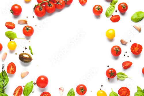 Composition with fresh cherry tomatoes and spices on white background