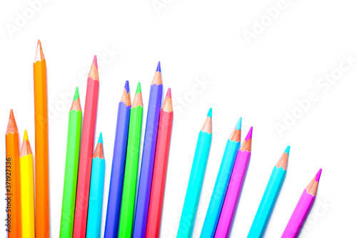 Set of color pencils on white background