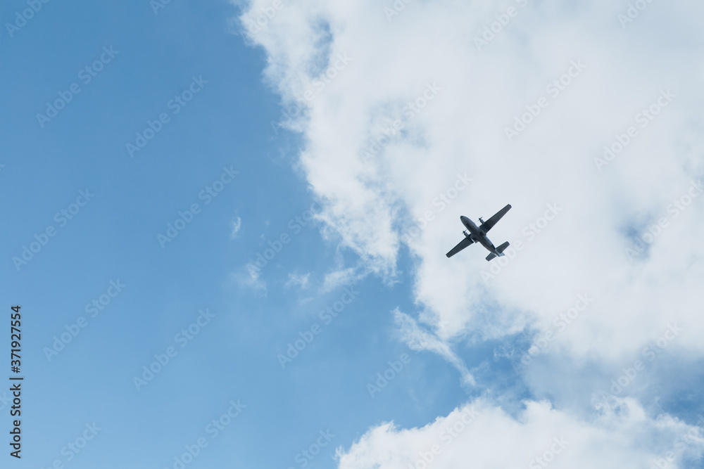 Airplane in the sky on a sunny day. Copy space. Airplane in the sky on a sunny day. Copy space.