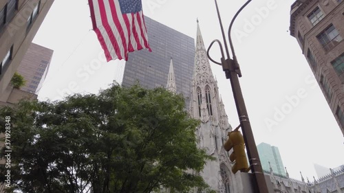 American National Flag on Building Opposite of St. Patrick's Cathedral, New York USA, Slow Motion