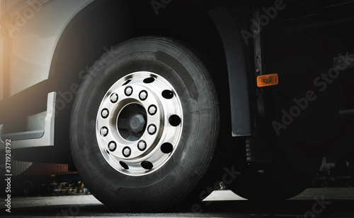 Close-up metal chrome, a truck wheels of semi truck. Freight transportation.
