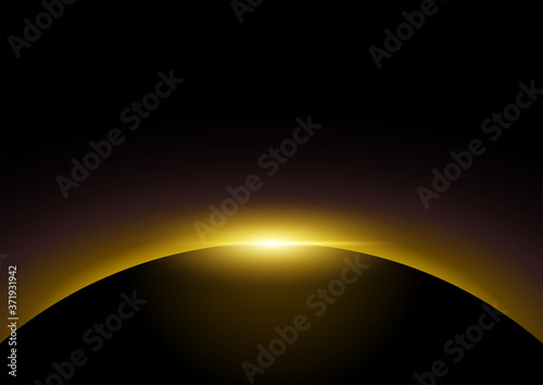 Golden light rising from dark background