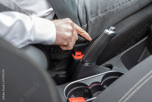 Fastening car seat belt