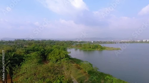 Wallpaper Mural Aerial view overlooking a Man made lake and the Jabi Recreational Park, sunny day, in Abuja, Nigeria -  pan, drone shot Torontodigital.ca