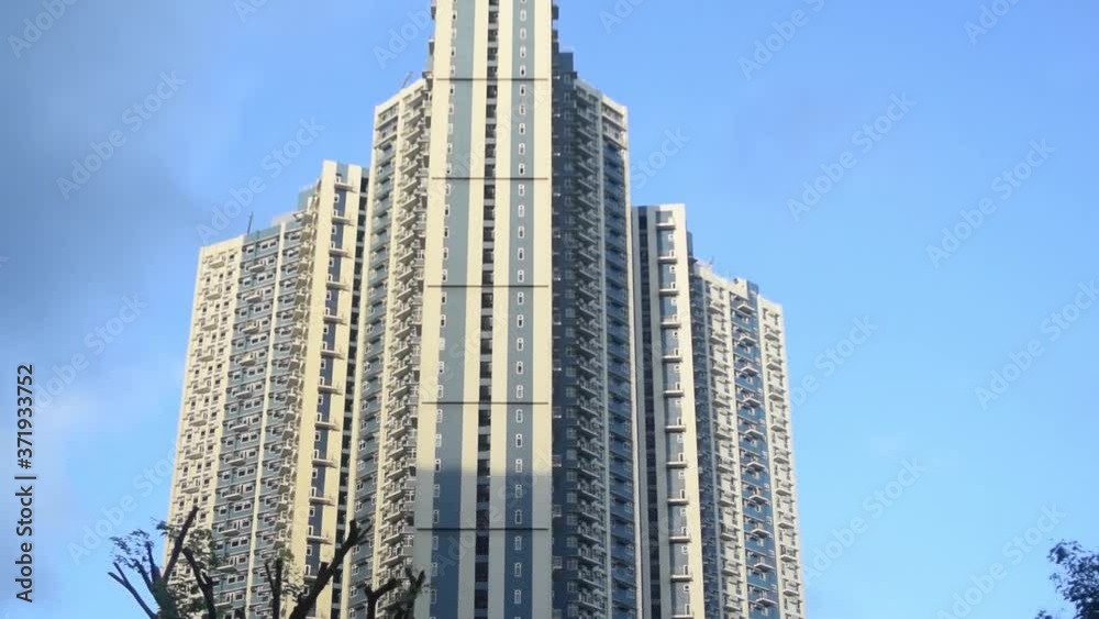 Top to bottom shot of apartment tower block in Bonifacio Global City, Manila Top to bottom shot of apartment tower block in Bonifacio Global City, Manila