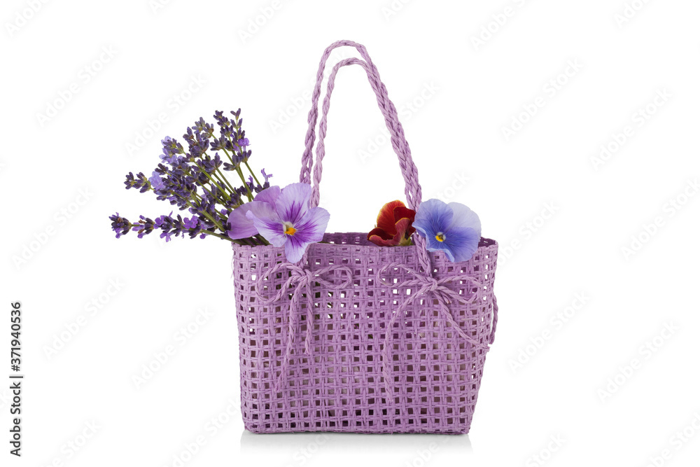 wicker bag with lavender flowers isolated on white wicker bag with lavender flowers isolated on white