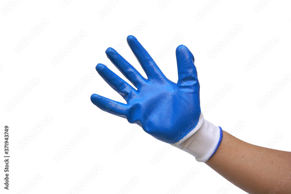 Obraz premium A hand wearing a PVC coated cotton gloves isolated on white background