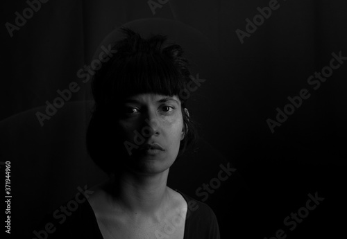 Dramatic black and white portrait of an indian girl