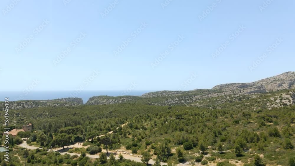 Pedestal shot of the calanques national park next to Cassis in France with the sea in the background Pedestal shot of the calanques national park next to Cassis in France with the sea in the background