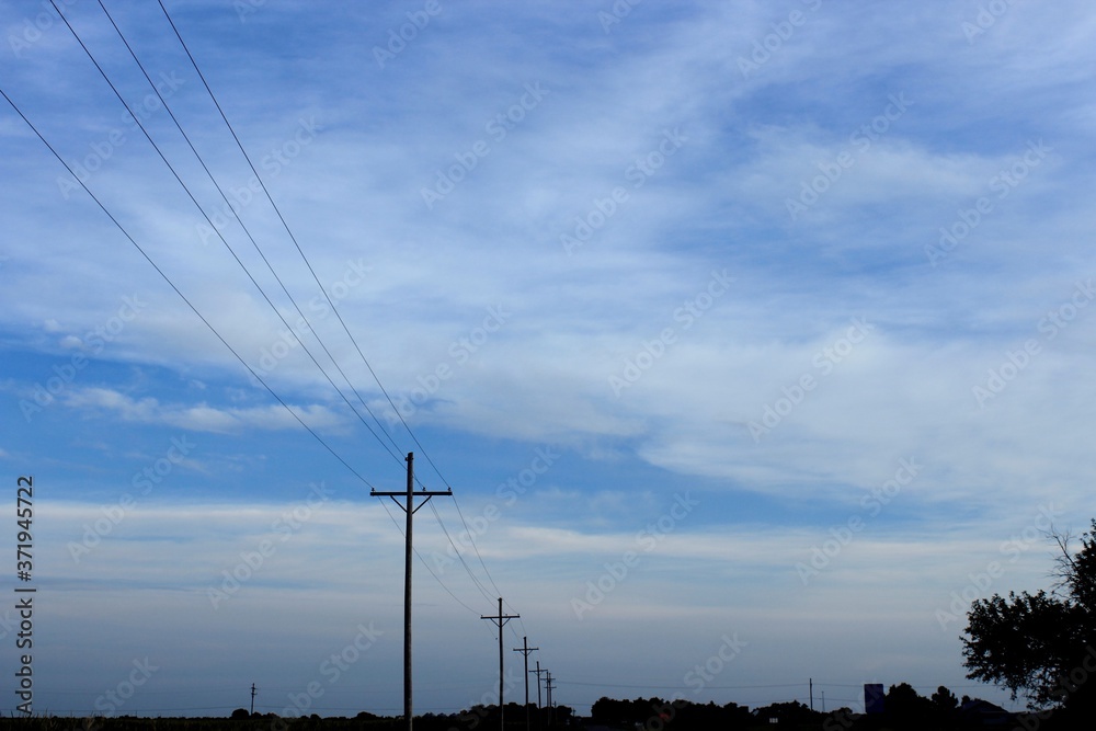 high voltage power lines out in the country north of Hutchinson Kansas USA.