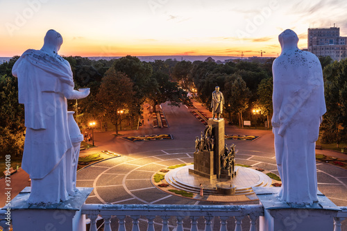 Old statues on the roof and view on Kharkiv park, Ukraine photo