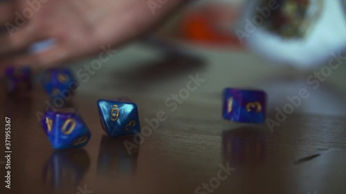 roll of dungeons and dragons dice in slow motion photo