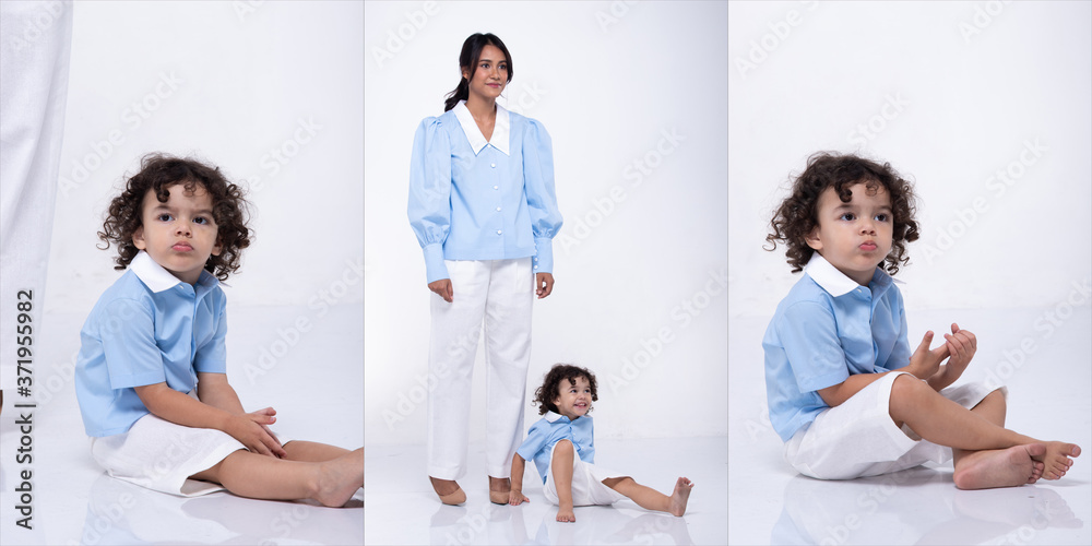 Fototapeta premium Asian Mother Caucasian Daughter Little girl hold mom hand and smile with love