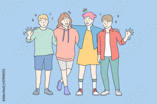 Friendship, portrait, happiness, joy, childhood concept. Happy cheerful smiling young children kids boys girls group friends standing hugging together looking at camera. Positive facial expressions.