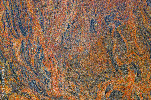 Abstract textured background of polished sandstone