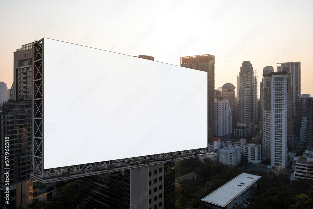 Blank white road billboard with Bangkok cityscape background at sunset. Street advertising poster, mock up, 3D rendering. Side view. The concept of marketing communication to promote or sell idea. Blank white road billboard with Bangkok cityscape background at sunset. Street advertising poster, mock up, 3D rendering. Side view. The concept of marketing communication to promote or sell idea.