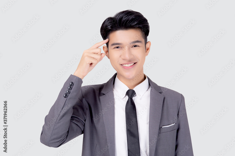 Portrait young asian business man in suit with smart thinking idea with intelligent isolated on white background, businessman standing and planning for success, manager or executive pointing head. Portrait young asian business man in suit with smart thinking idea with intelligent isolated on white background, businessman standing and planning for success, manager or executive pointing head.