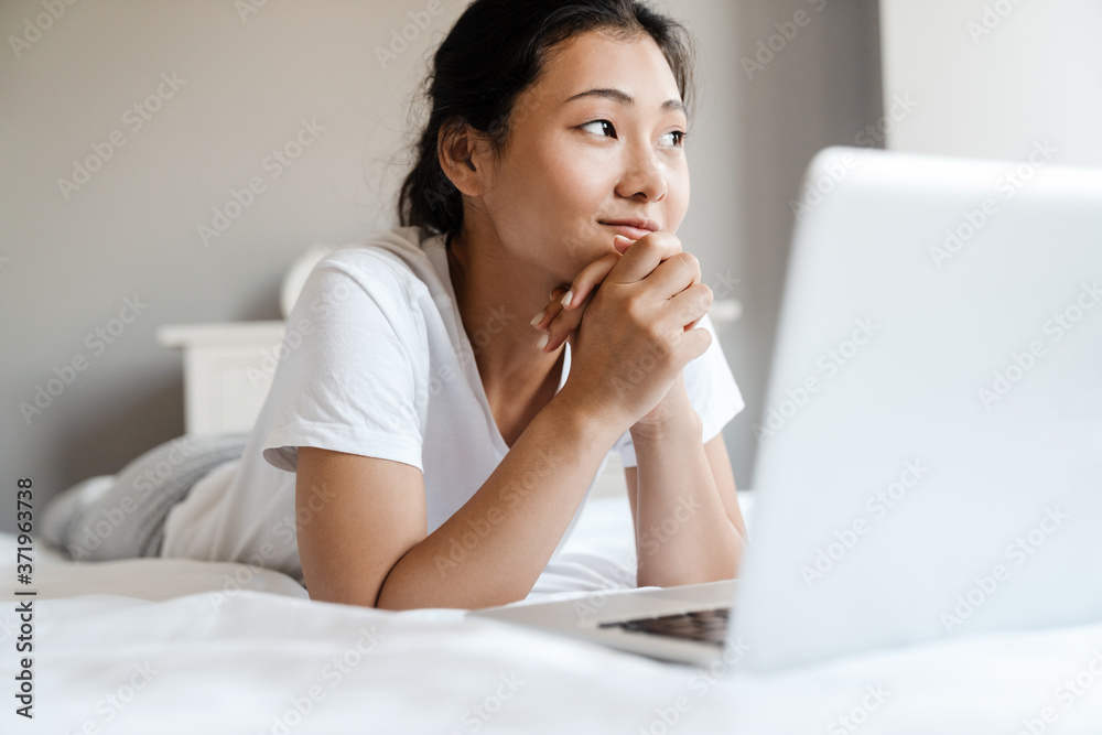 Beautiful young asian woman in bed Beautiful young asian woman in bed