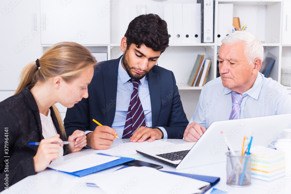 Fototapeta premium Managers are writing financial reports in the office.