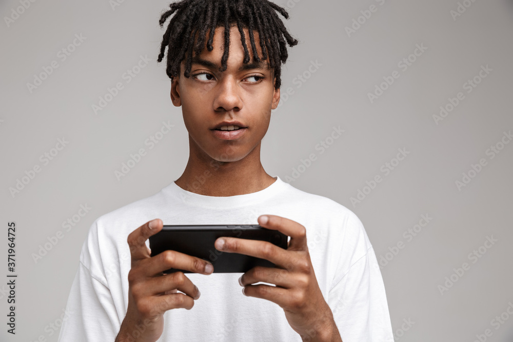 Portrait of a young african man dressed in plaid shirt Portrait of a young african man dressed in plaid shirt