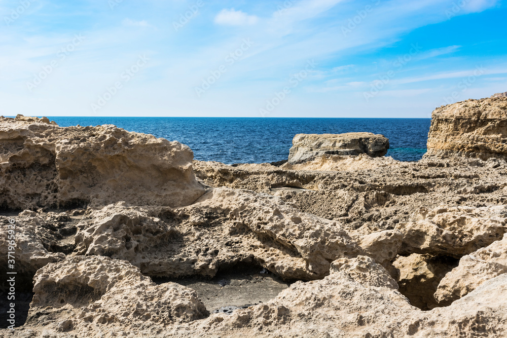 Rugged coastline of island of Gozo