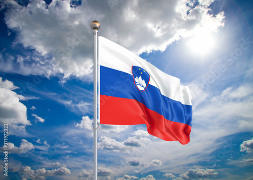 Realistic flag. 3D illustration. Colored waving flag of Slovenia on sunny blue sky background.
