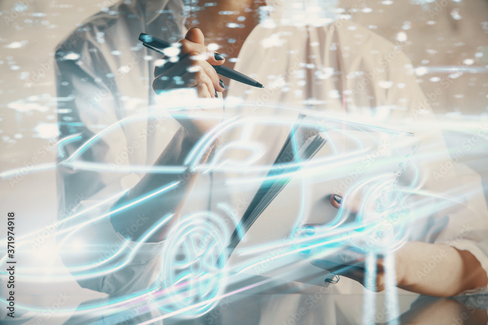 Tech autopilot theme hologram over woman's hands taking notes background. Concept of hightech. Double exposure Tech autopilot theme hologram over woman's hands taking notes background. Concept of hightech. Double exposure
