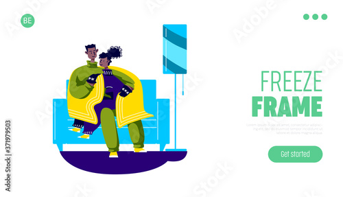 Landing page with couple warming up together sitting on couch hugging under blanket