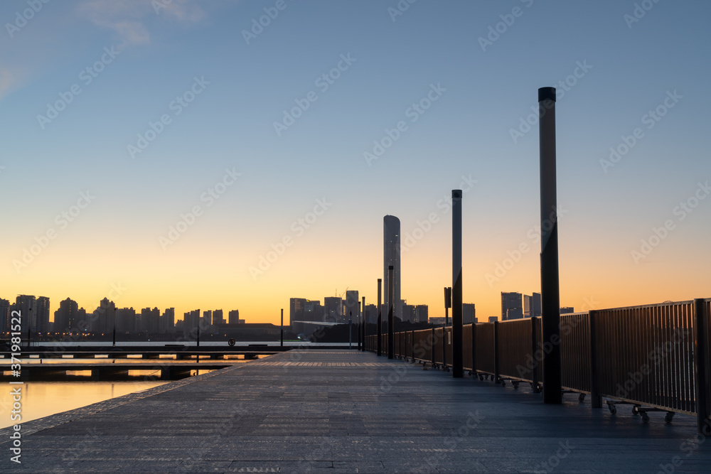 Empty concrete platform on a sunny morning. Empty concrete platform on a sunny morning.