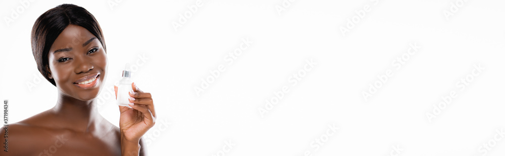 african american naked woman holding bottle of serum isolated on white, panoramic shot african american naked woman holding bottle of serum isolated on white, panoramic shot