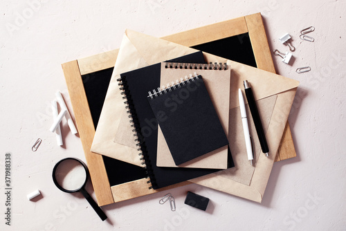 Education or office supplies on the textured beige table photo