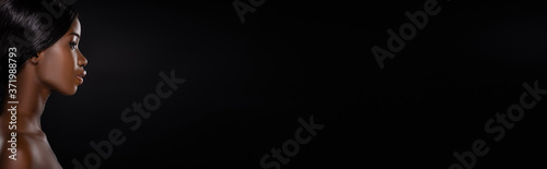 side view of african american naked woman isolated on black, panoramic shot