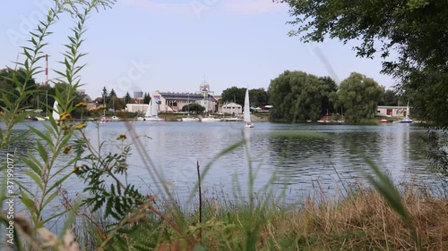 Sailboats float on the lake. photo