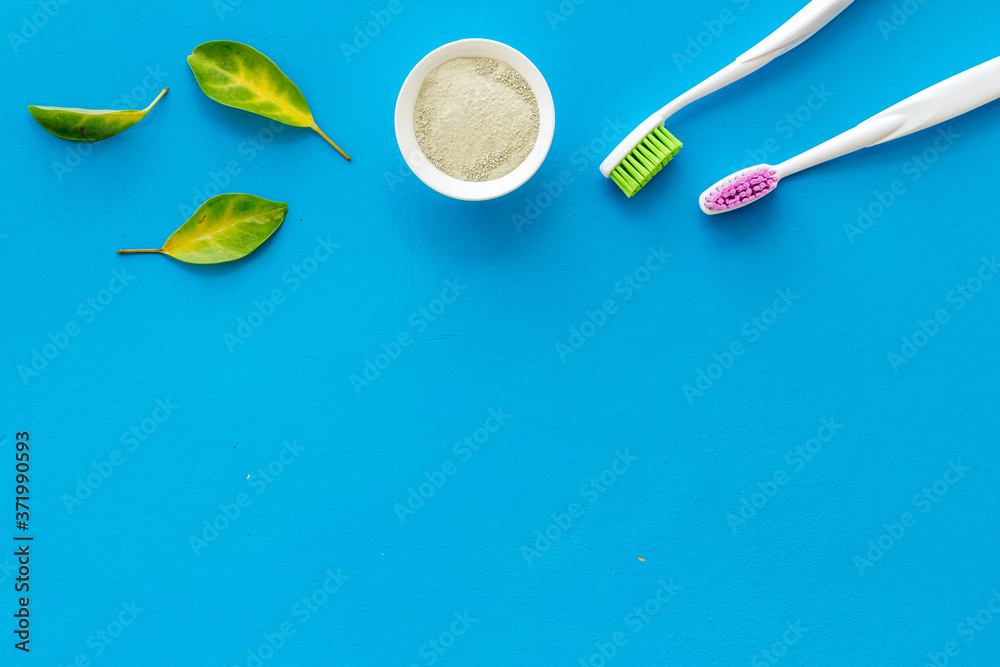 Herbal dental tooth powder with toothbrush. Organic health care concept Herbal dental tooth powder with toothbrush. Organic health care concept