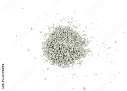 Gray small rocks ground texture isolated white background. black small road stone. gravel pebbles stone seamless texture. dark background of crushed granite gravel, close up. clumping clay
