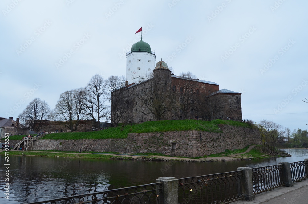 Vyborg. City. Clock. Clock tower. Europe. Russia. castle, architecture, tower, sky, old, church, history, ancient, fortress, building, medieval, wall, stone, russia, travel, europe, blue, fort, vyborg