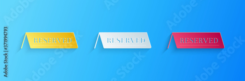Paper cut Reserved icon isolated on blue background. Paper art style. Vector.