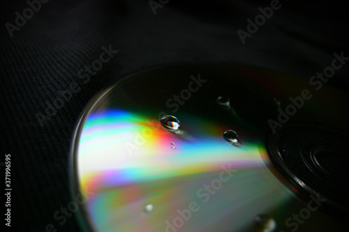 CD with water drops close up