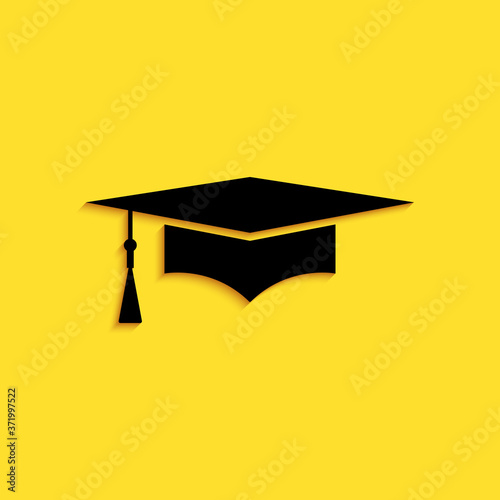 Black Graduation cap icon isolated on yellow background. Graduation hat with tassel icon. Long shadow style. Vector.