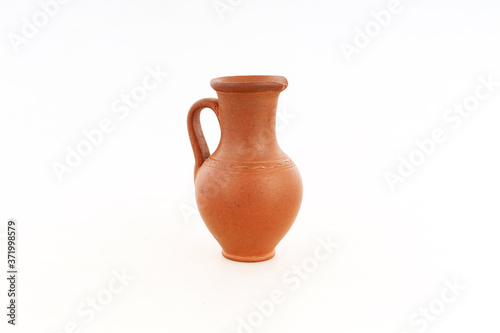 Ceramic jug isolated on a white background.
