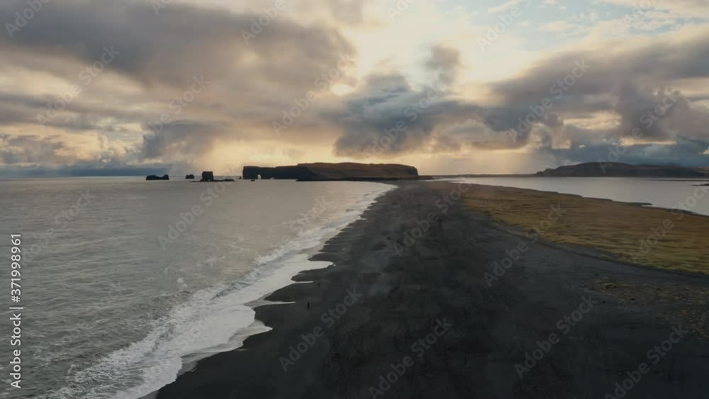 Drone view of black sand beach. Flying over reynisfjara beach in south of Iceland.
Drone view of black sand beach. Flying over reynisfjara beach in south of Iceland.