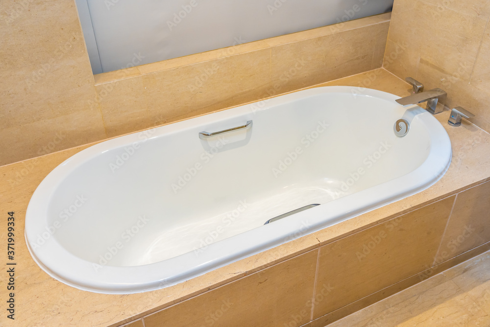 Empty luxury bathtub decoration interior of bathroom Empty luxury bathtub decoration interior of bathroom