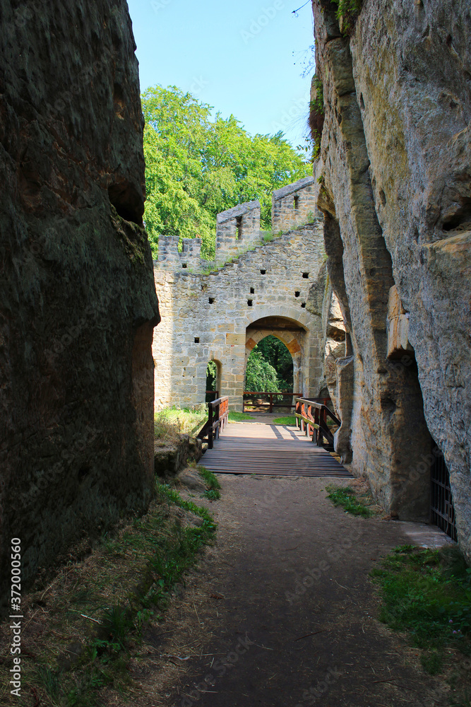 path between the walls of the ruined castle