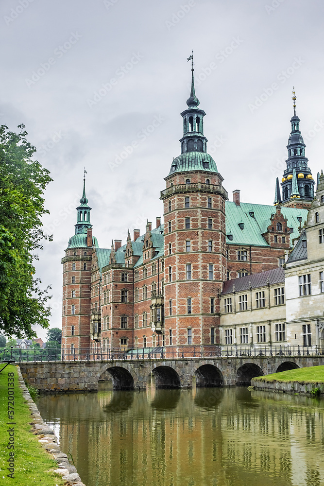 Naklejka premium Frederiksborg Castle (Frederiksborg Slot, XVII century) - palace in Hillerod, Denmark. Castle built as royal residence for King Christian IV of Denmark-Norway, now History Museum. 