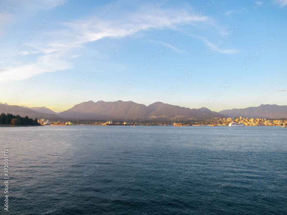 View from Vancouver to North Vancouver with sea, ships, buildings and mountains. 