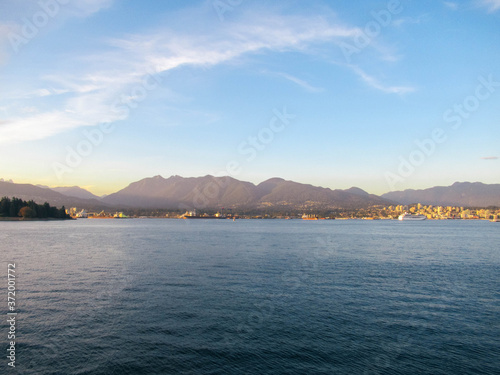 View from Vancouver to North Vancouver with sea, ships, buildings and mountains. 