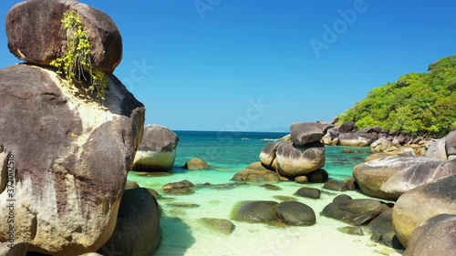 Aerial view of the ocean waves, white beaches and clear blue water and beautiful reefs and forests. Nga Khin Nyo Gyee Island Myanmar. Summer travel concept photo